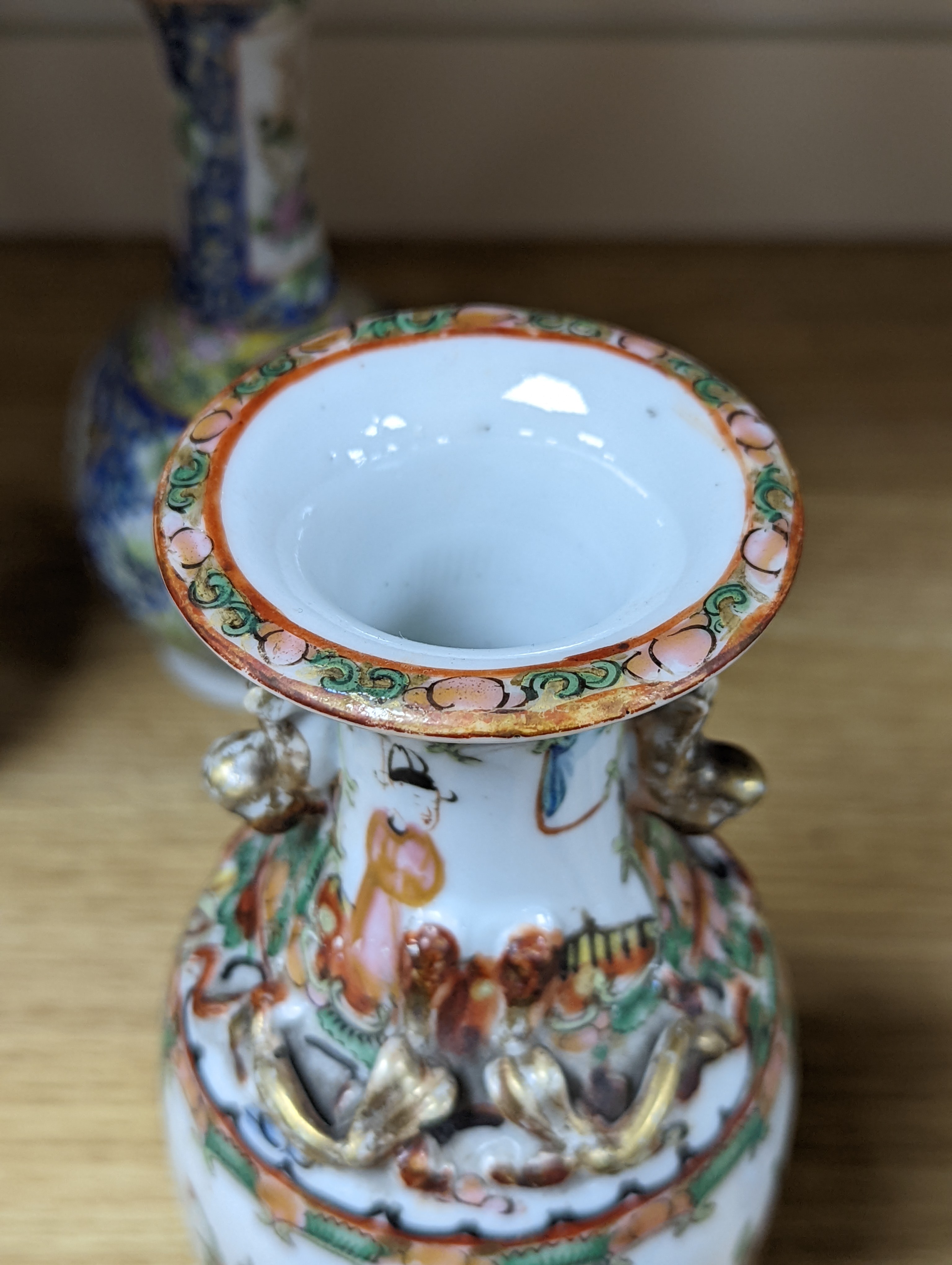 Four 19th century Chinese famille rose vases, 21cm